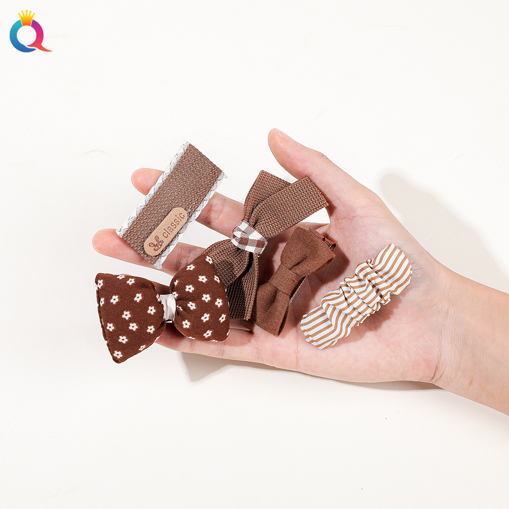Qiyue Cross-border Fabric Bow Hair Clips, Little girl milk tea-colored bangs clips, ins duckbill clips hair accessories wholesale Application Scenario