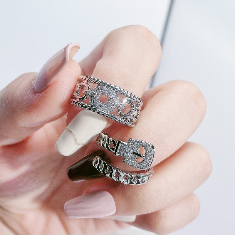 This is a fashionable and versatile index finger ring with a unique design for women, featuring a double-layer belt buckle and zircon chain opening Specification drawing