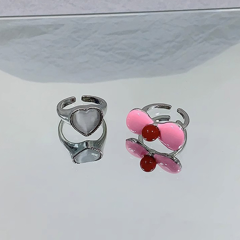Sweet and cool pink bow, heart-shaped moonstone open ring, women's niche design index finger ring, fashionable and individual ring full figure