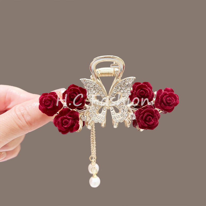 New high-end mid-sized rhinestone hollowed-out butterfly flower tassel clipper for the back of the head, semi-tied shark clipper hair accessory Application Scenario