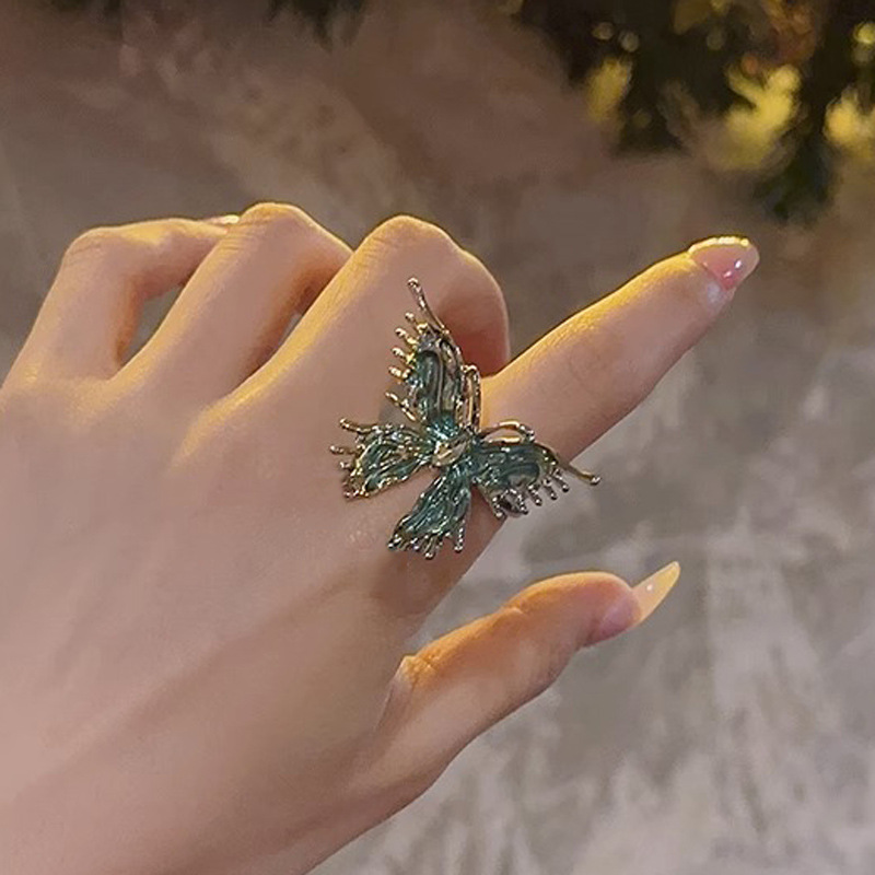 Unique and elegant liquid blue butterfly ring, a light luxury and niche drip glaze open ring for women, a fashionable and individual versatile accessory Specification drawing