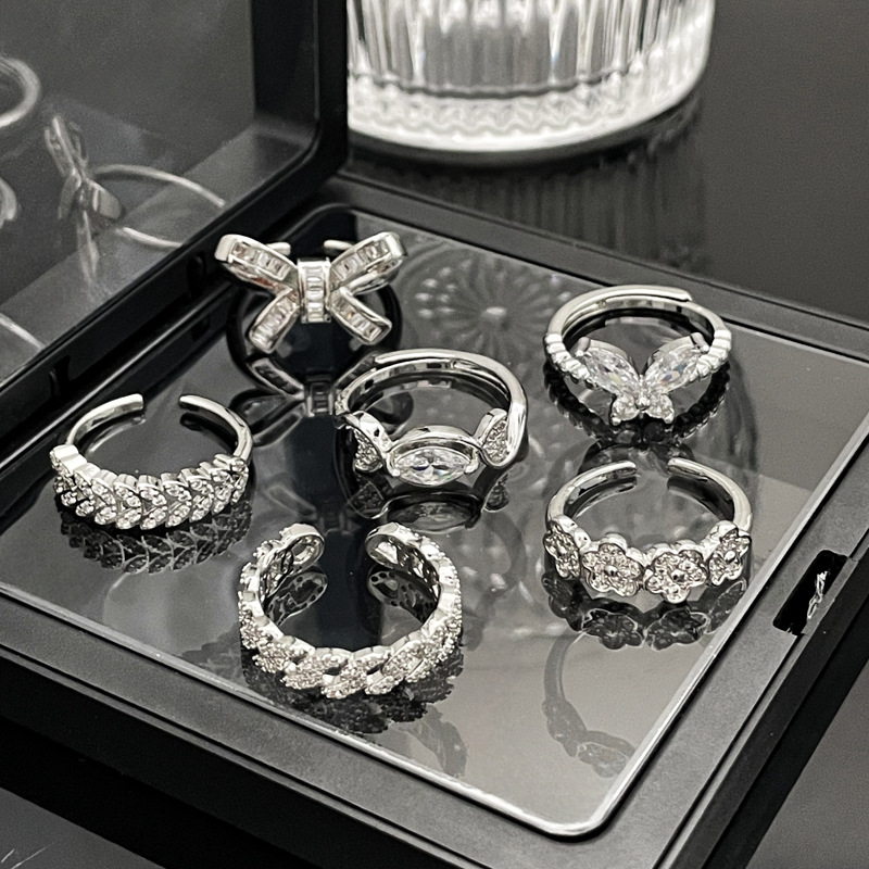 A niche and light luxury butterfly fashion full-diamond open-top ring for women, exquisitely layered and unique floral sweet and cool style index finger ring Specification drawing
