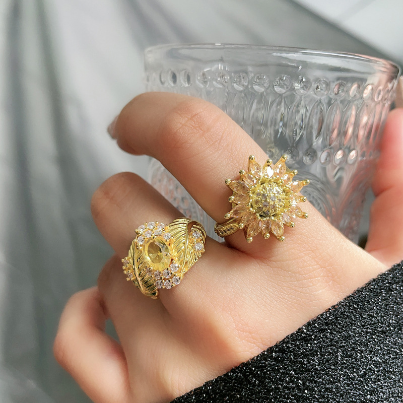 Cross-border European and American high-end, light luxury sunflower gold temperament adjustable ring, heavy industry personality cold style ring full figure