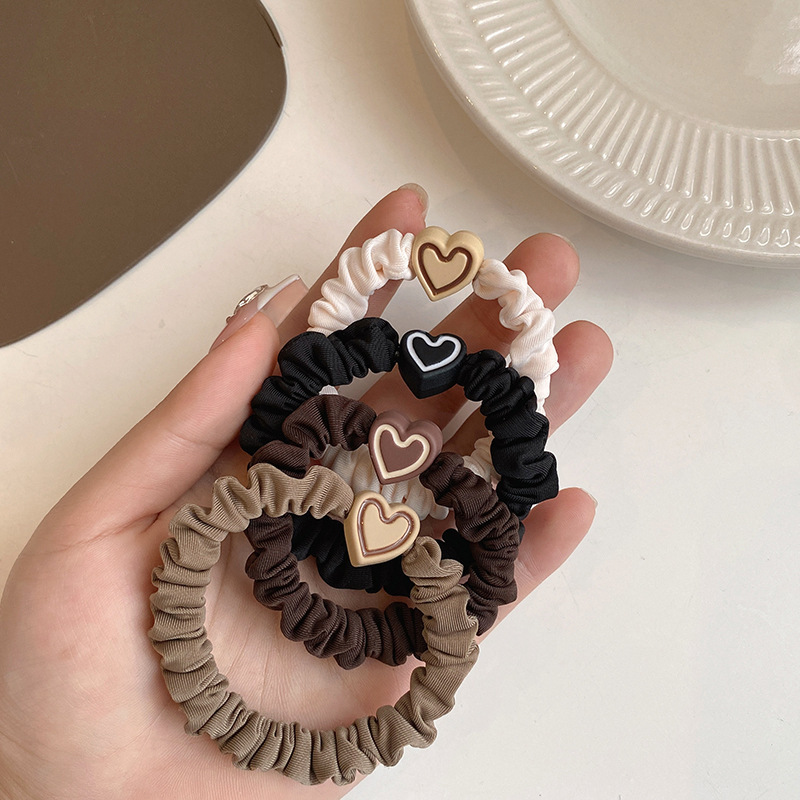 A simple high ponytail hair tie with a rubber band for women, a stylish hair tie with high elasticity and durability. The 2025 new style hair band full figure