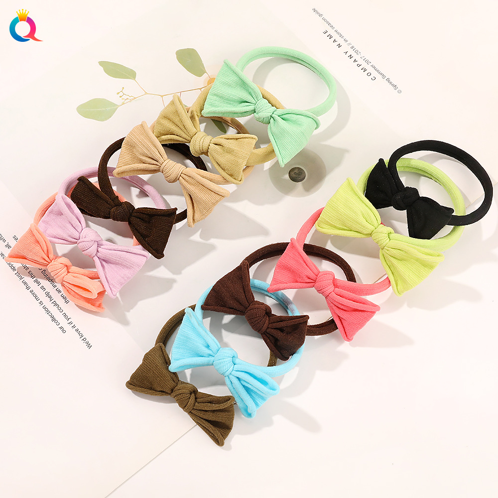 Qiyue Japanese and Korean popular candy-colored hair tie basic style bow seamless hair band simple ponytail rubber band Application Scenario