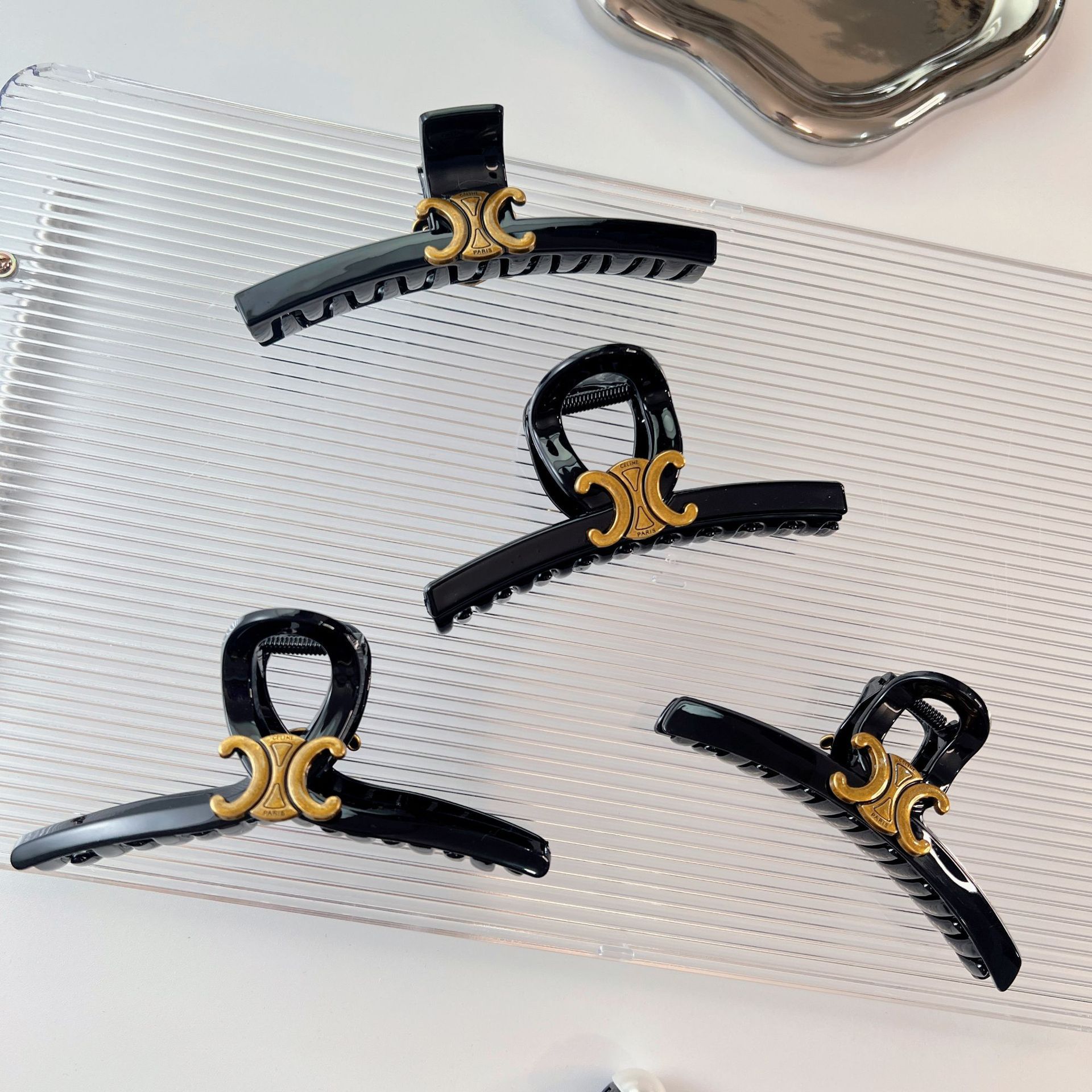 Celi light luxury style Arc de Triomphe black hair clip, high-end retro letter grab clip, acrylic new hair clip and hair accessory details Picture