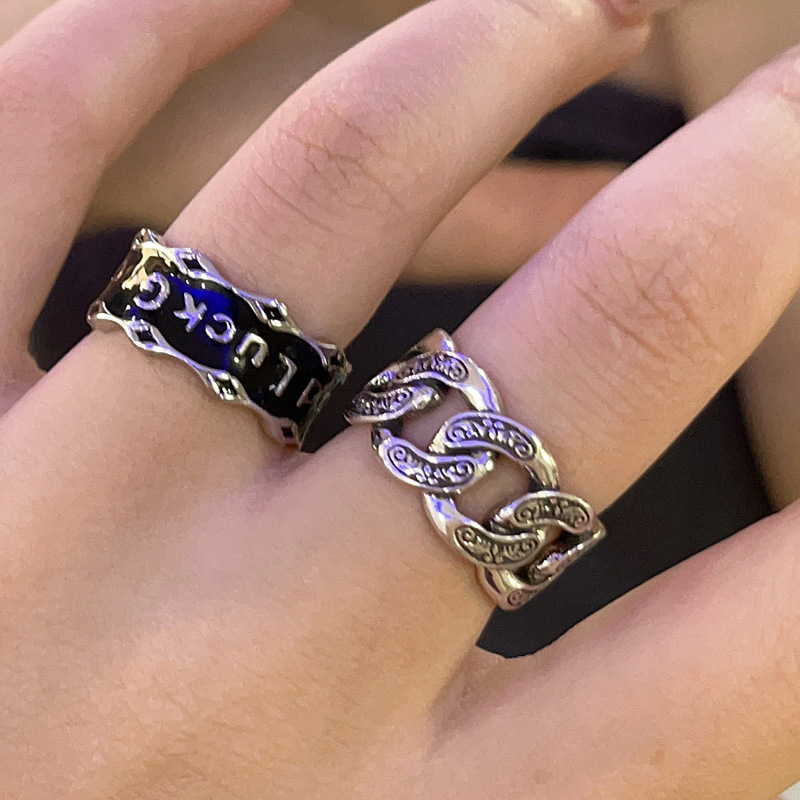 A simple and individual black glazed open ring in the style of European and American Instagram, a cold and cool hip-hop chain food ring for women full figure