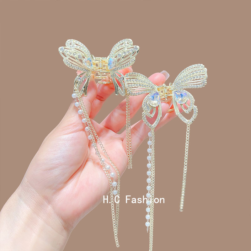 The exquisite and high-end butterfly tassel grab, the semi-tied hair grab at the back of the head, the shark clip, and the elegant ponytail hair accessory details Picture