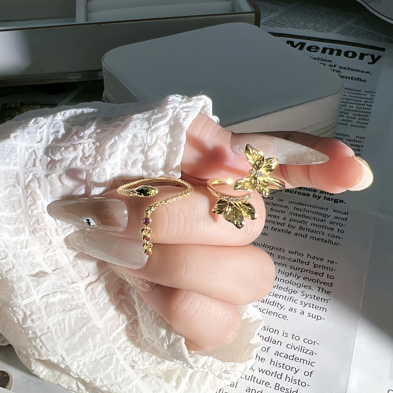 The new product features an ancient and retro texture butterfly opening ring with a unique design for women. It is simple and stylish with a serpentine tassel details Picture