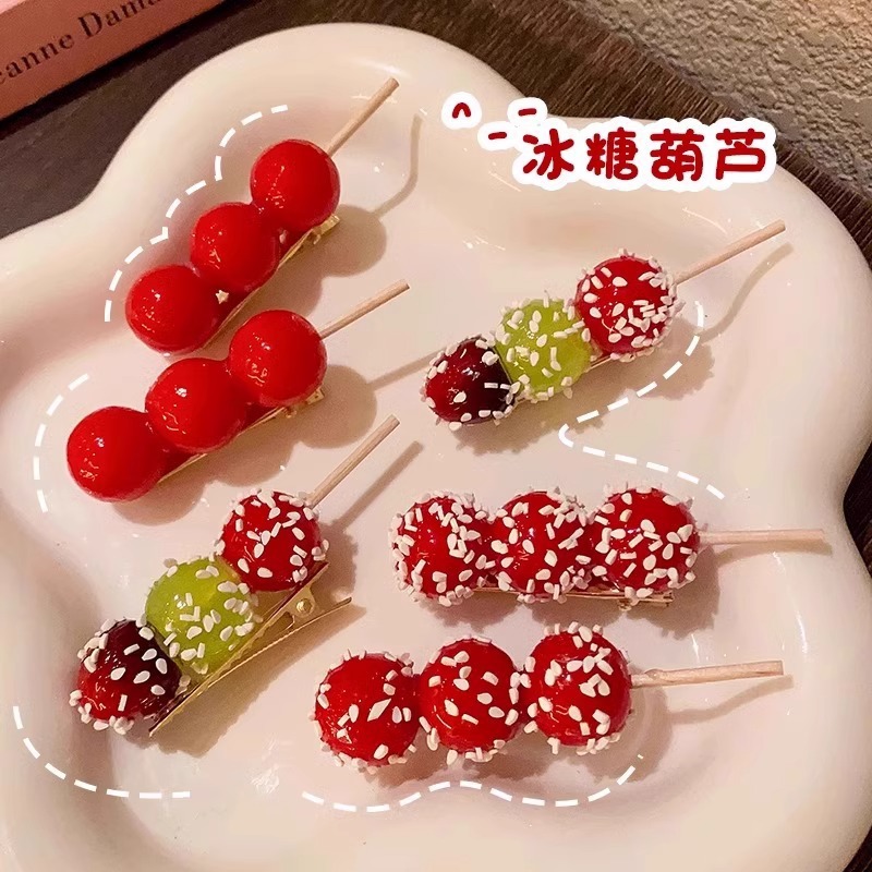 Simulated sugar-coated haws hair clips are popular online. Cute and fun food and play. Students hold hair clips on both sides. Female wholesale hair accessories details Picture