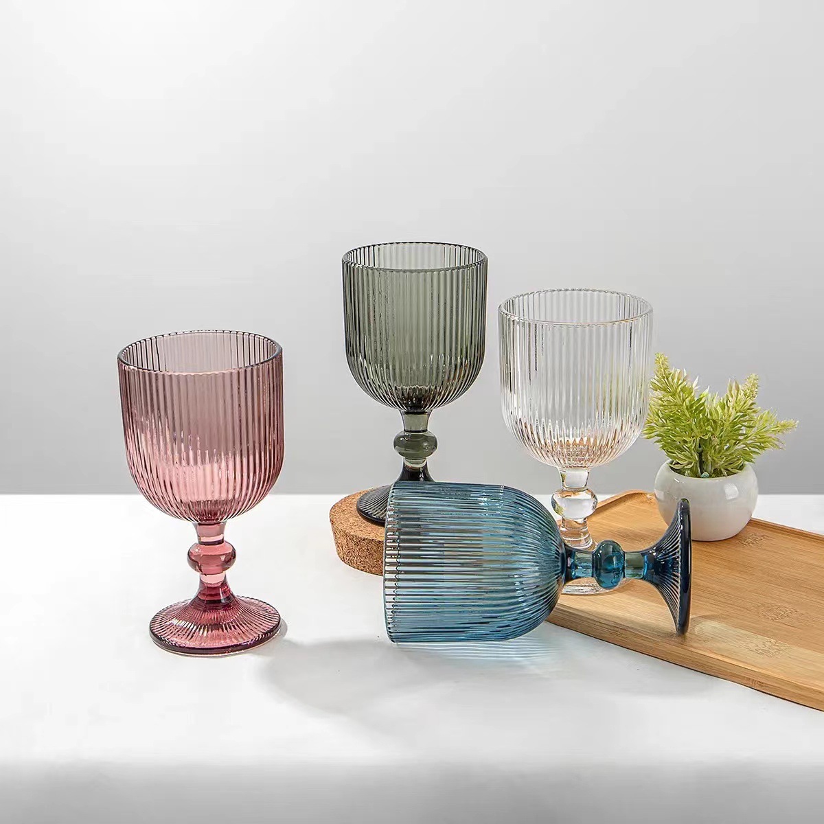 Colorful retro European vertical patterned spherical glass highball cups, champagne cups, wine glasses, water cups and ice cream cups full figure