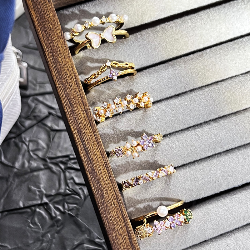 Korean-style light luxury small diamond pearl inlaid elegant ring, women's bow, niche design, sweet and cool, versatile ring Application Scenario
