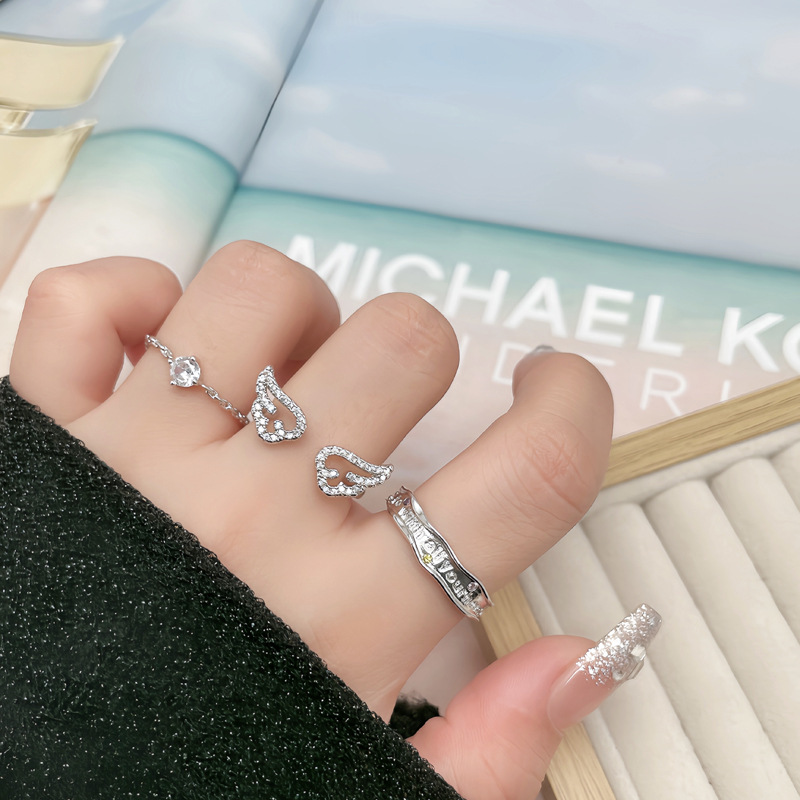 Korean-style niche and simple letter color diamond adjustable ring, women's wing slightly set light luxury and fashionable single diamond versatile ring full figure