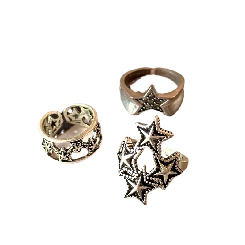 This Korean retro five-pointed star ring is exquisitely stacked and features a niche open-top design on the index finger ring. It has a cool and cool style Item Picture