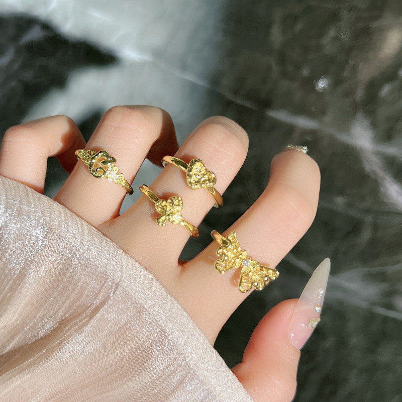 Retro plain ring with irregular pleated texture, heart-shaped butterfly opening ring, simple and individual geometric niche ring for women Application Scenario