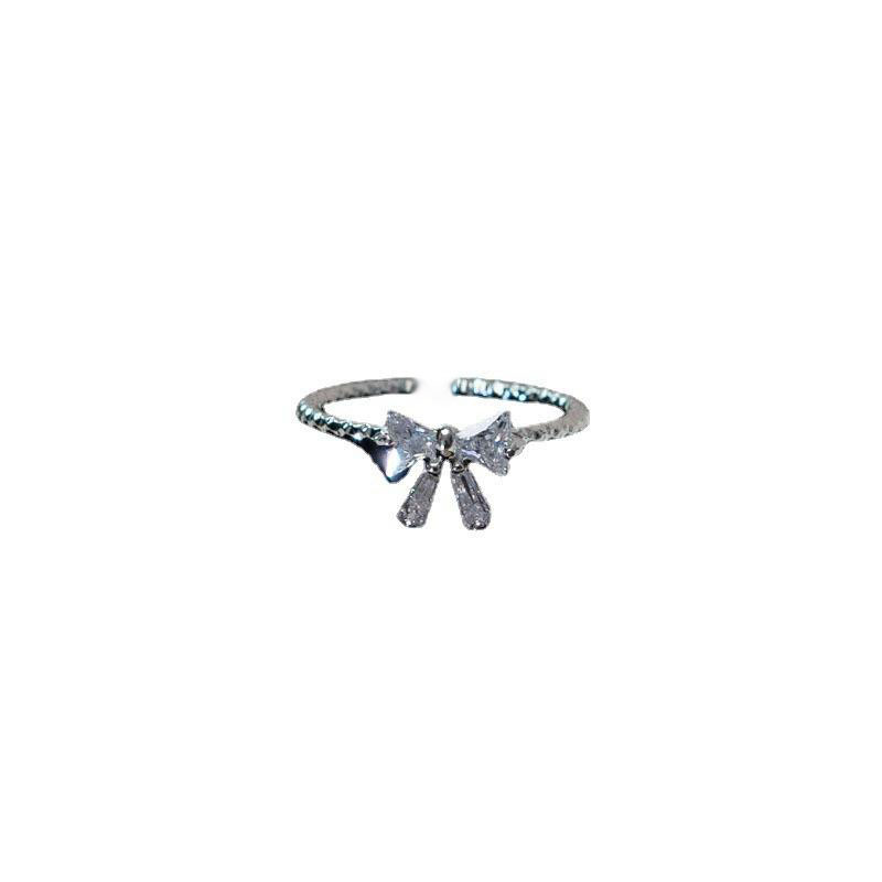 The sweet and girlish style of the silver bow ring with an adjustable opening is a unique design for women, exuding a sense of sophistication Item Picture