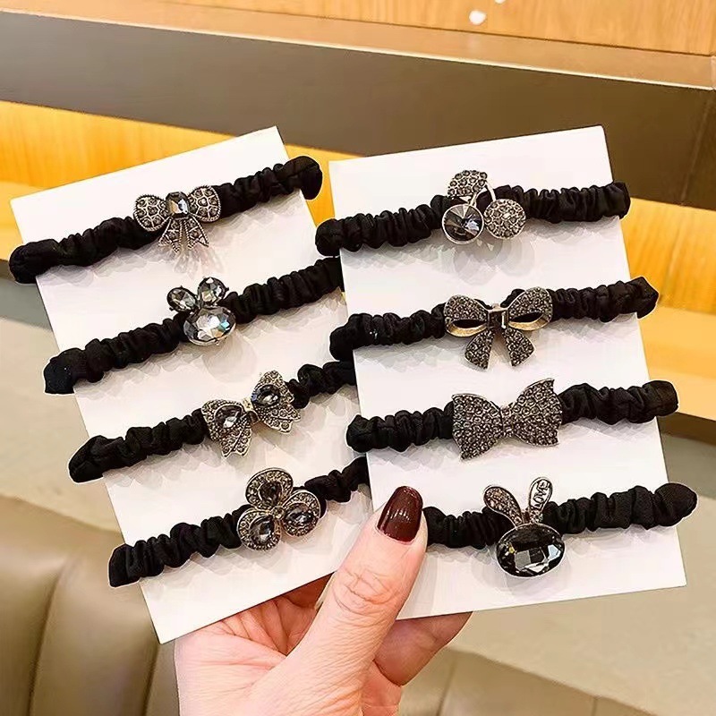 The bow hair tie and hair band from Dongdaemun, South Korea, exudes a high-end, retro Korean style headwear, hair tie, small intestine band and leather band full figure