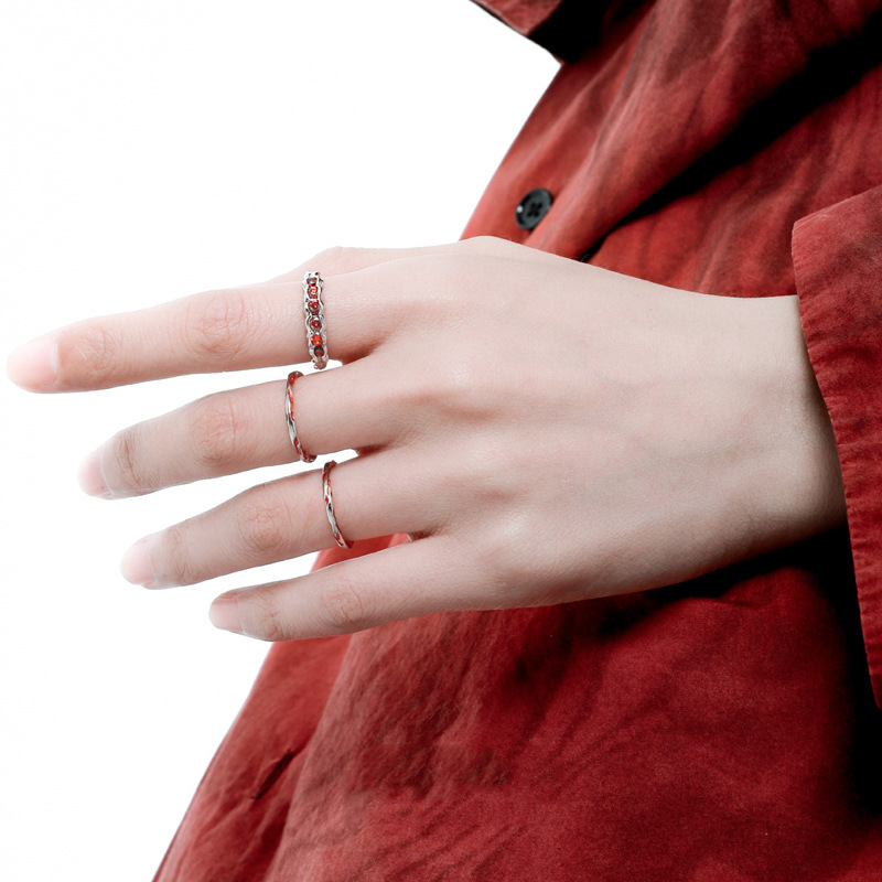 A simple glazed red zircon open ring for women, with a unique and high-end look. It's an ins cold style and versatile food ring full figure