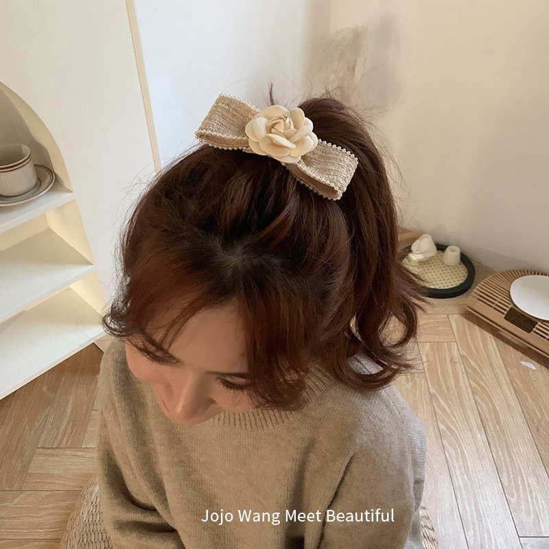 Korean camellia bow hairpin for women, a high-end hair accessory, a spring clip for the back of the head Specification drawing