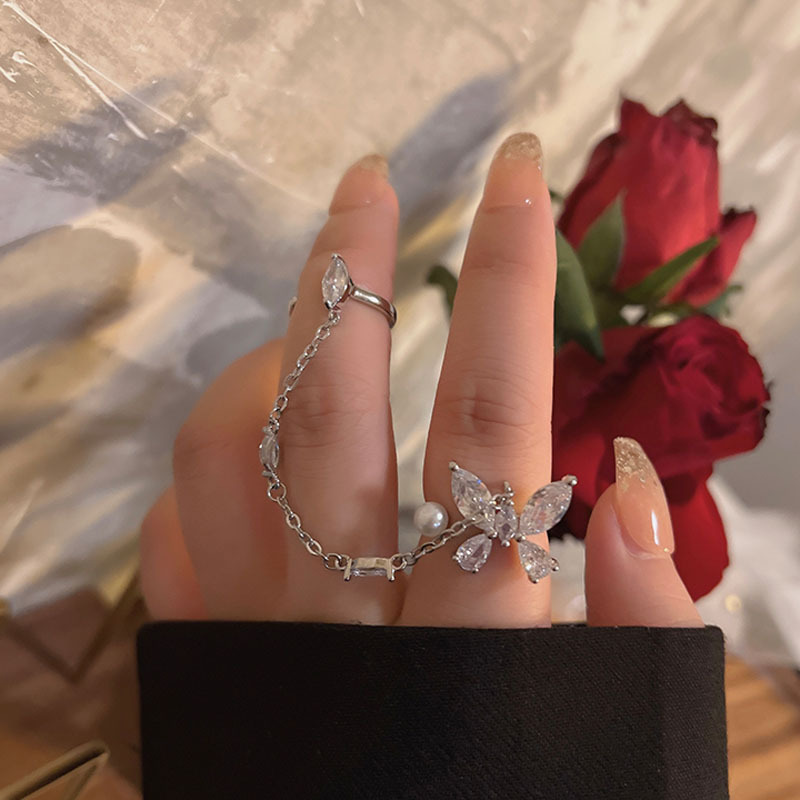 Zircon butterfly chain ring with two fingers integrated, featuring an ins unique and niche design. The opening is adjustable for the index finger ring details Picture
