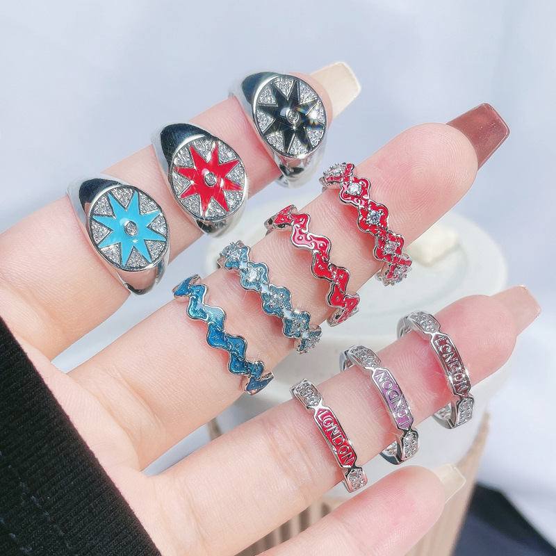 A light luxury and high-end starlight glaze open ring with female letters, a niche and cold style, exquisite quality, sweet and cool ring trend Application Scenario