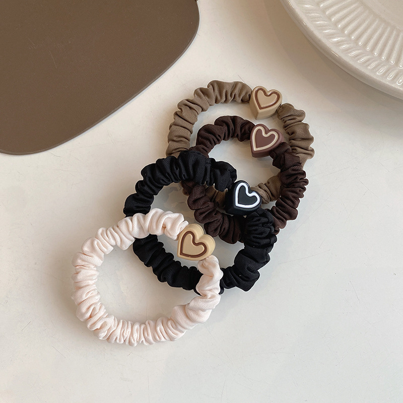 A simple high ponytail hair tie with a rubber band for women, a stylish hair tie with high elasticity and durability. The 2025 new style hair band Specification drawing