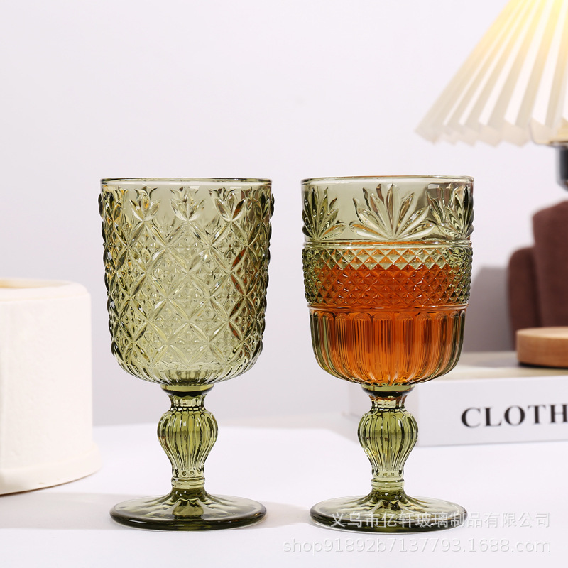 Factory wholesale vintage embossed glass wine glasses, European tall glass cups, colorful birthday juice cups for household use details Picture