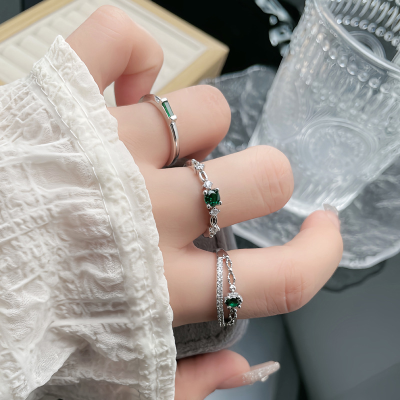 Korean-style trendy light luxury emerald zircon imitation small and versatile ring for women, adjustable hollowed-out niche and elegant ring full figure