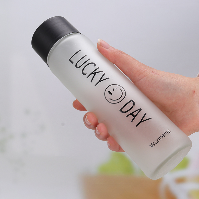 The frosted glass water cup with a drawstring is a simple forest-style cup that can be carried with a drawstring for creative outdoor sports details Picture