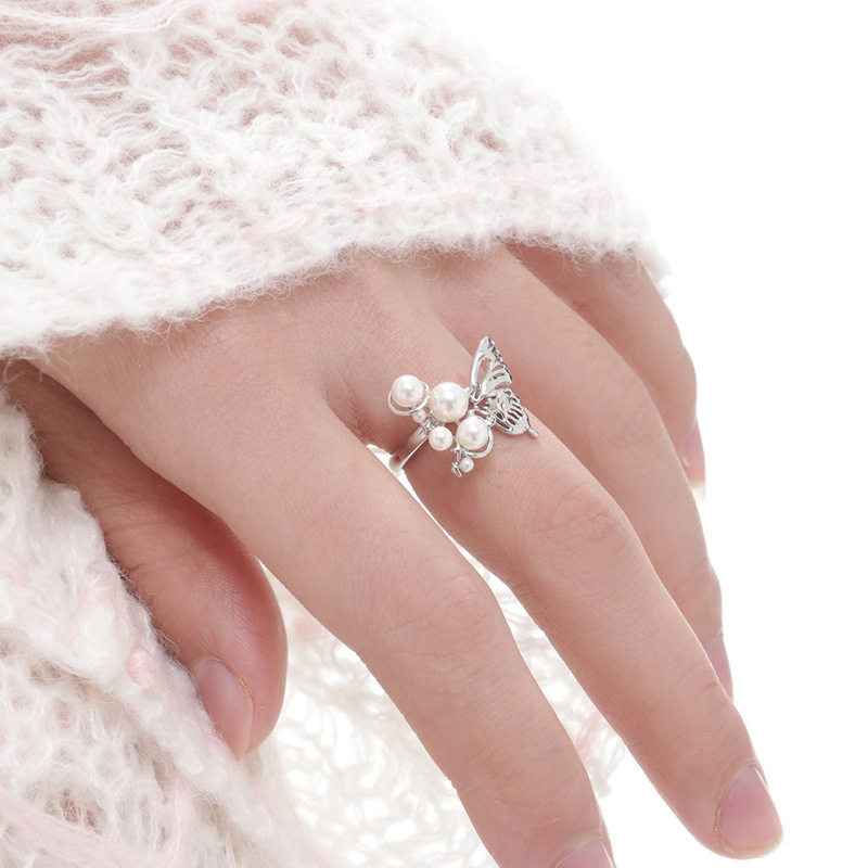 A simple and elegant three-dimensional planet pearl butterfly open ring, a niche design for women, with a unique and versatile style Application Scenario