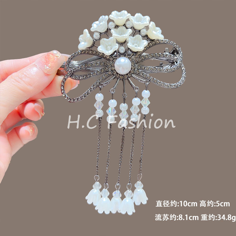 Exquisite tassel clip women's new lily of the valley flower hairpin bun hair clip back head twist clip Application Scenario