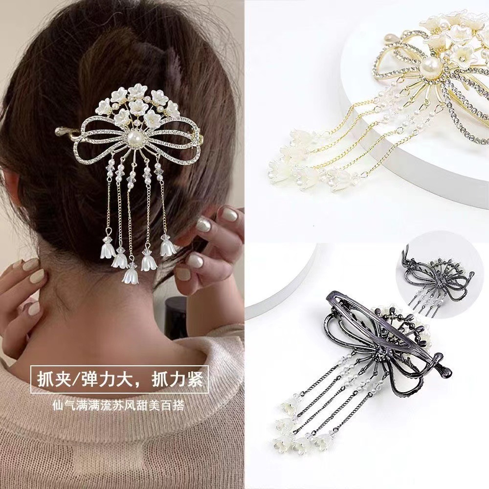Exquisite tassel clip women's new lily of the valley flower hairpin bun hair clip back head twist clip details Picture