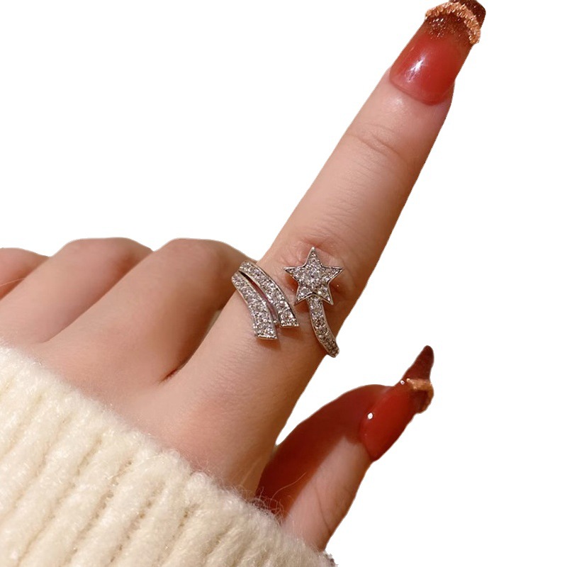This light luxury and high-end full-diamond zircon star opening ring is worn by a woman in layers, exuding a sweet and cool temperament and a unique texture. It's a trendy index finger ring Item Picture