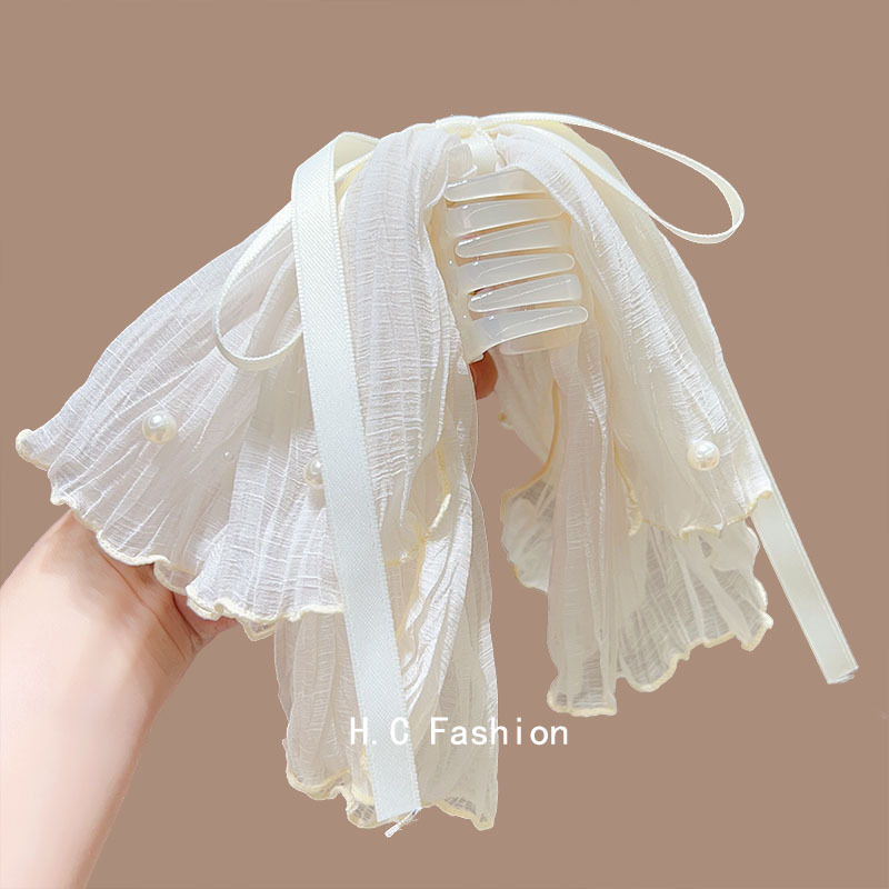 Korean sea salt blue daily mesh silk ribbon bow ponytail grab with pearl embellishment, high skull top fixed hairpin for a woman Application Scenario