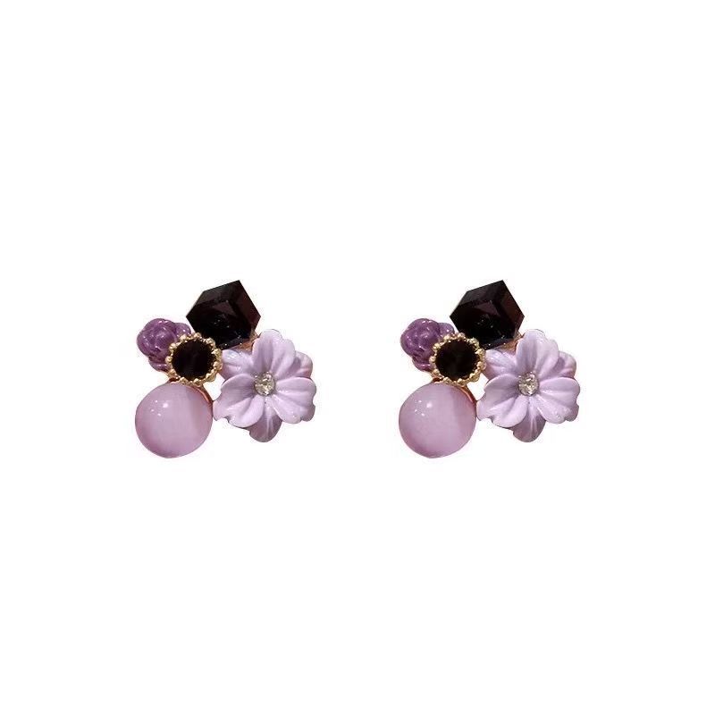 Purple crystal night mist flower stud earrings for women exude a light luxury and high-end charm, failing to live up to one's temperament. These earrings feature a niche design sense Item Picture