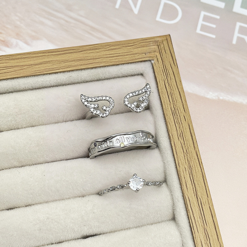 Korean-style niche and simple letter color diamond adjustable ring, women's wing slightly set light luxury and fashionable single diamond versatile ring Application Scenario