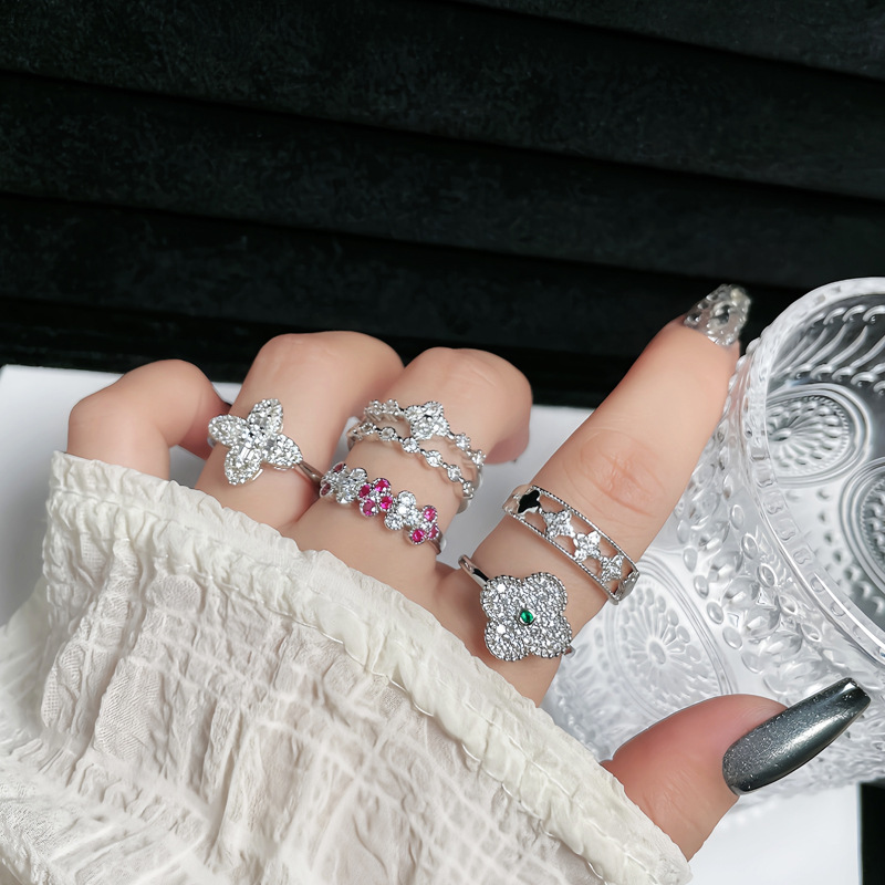A new Korean-style light luxury four-leaf clover full-diamond open ring for women's Instagram, with a cold and unique style and exquisite index finger ring full figure
