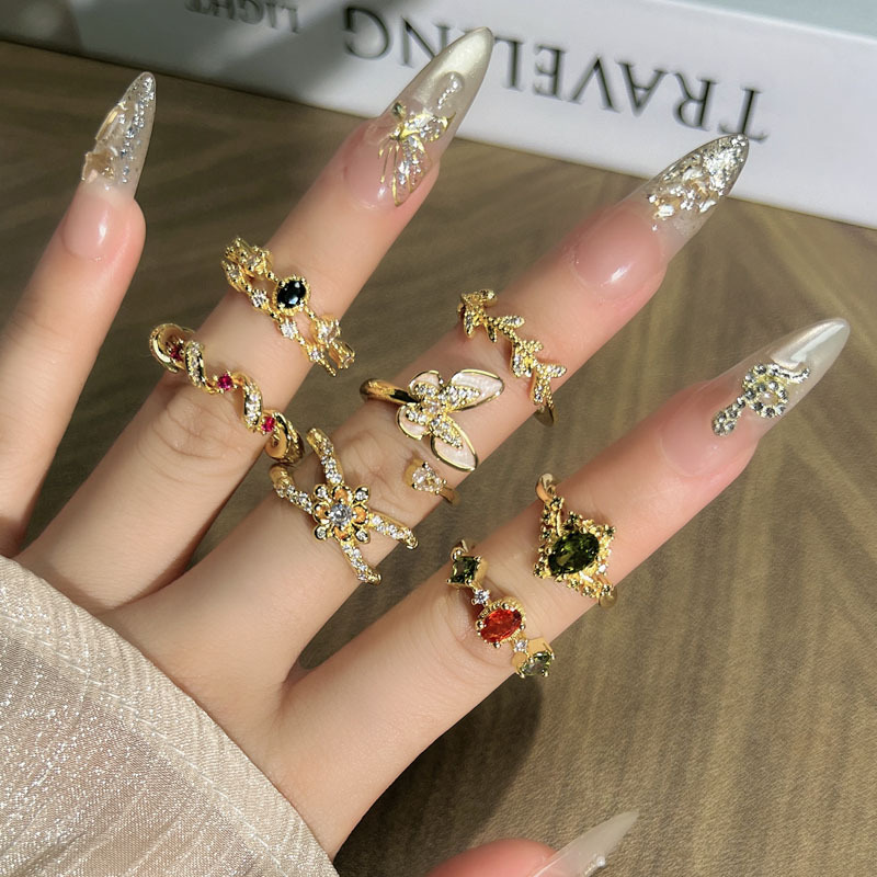 A retro mixed and layered, slightly inlaid, fashionable and elegant ring with a niche design sense for women, a light luxury butterfly, and a cold style ring trend Application Scenario
