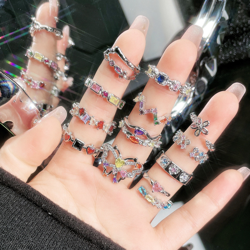 New irregular colored diamond zircon light luxury open ring, a niche design for women, with a cold and unique style, sweet and cool index finger ring full figure