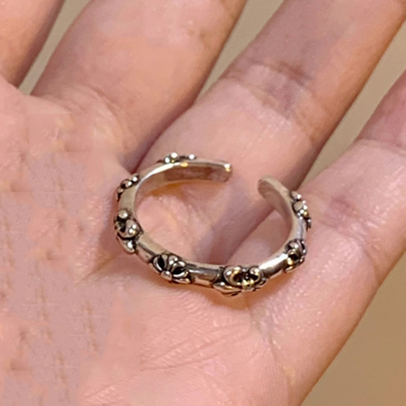 A simple, dark, aged cross-shaped open ring for women, a trendy and unique European and American fashion design Application Scenario