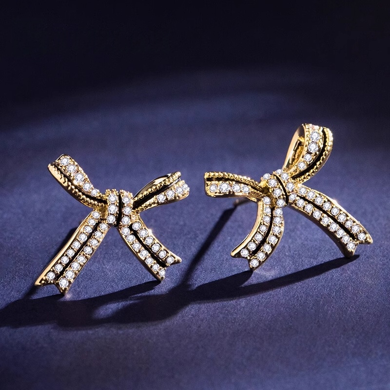 Xuhui brand exquisite and light luxury copper plated with real gold and set with zircon 925 silver needle bow, lacquered, fashionable and elegant stud earrings full figure