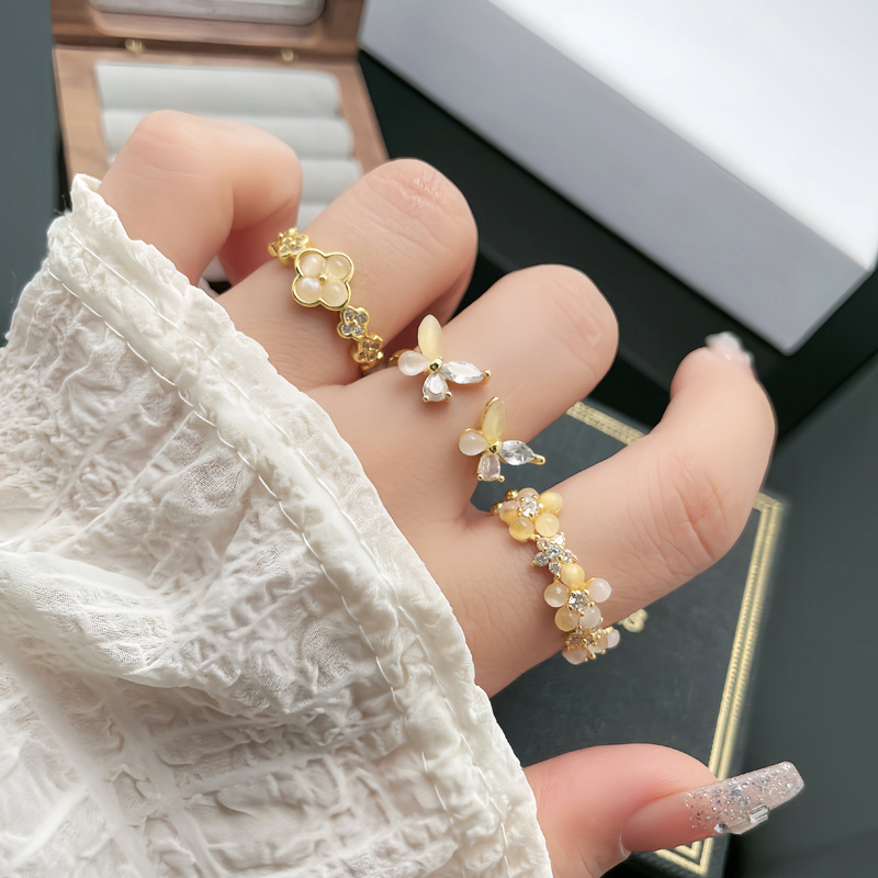 The popular online hit flower butterfly sweet, cool and fashionable open ring, a delicate and versatile cat's eye stone ring with a unique and elegant style details Picture
