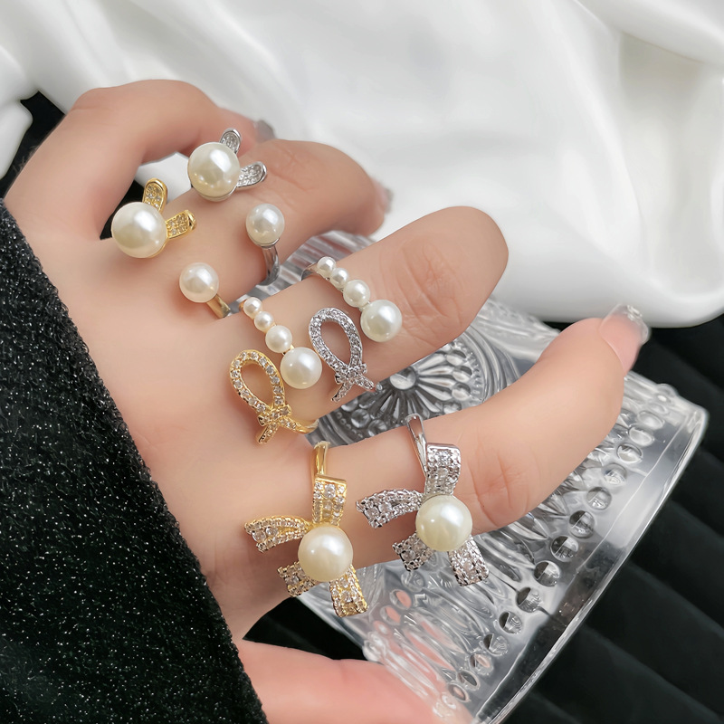 French-style sweet and cool bow pearl opening ring, Korean version rabbit student simple ring, niche design Specification drawing