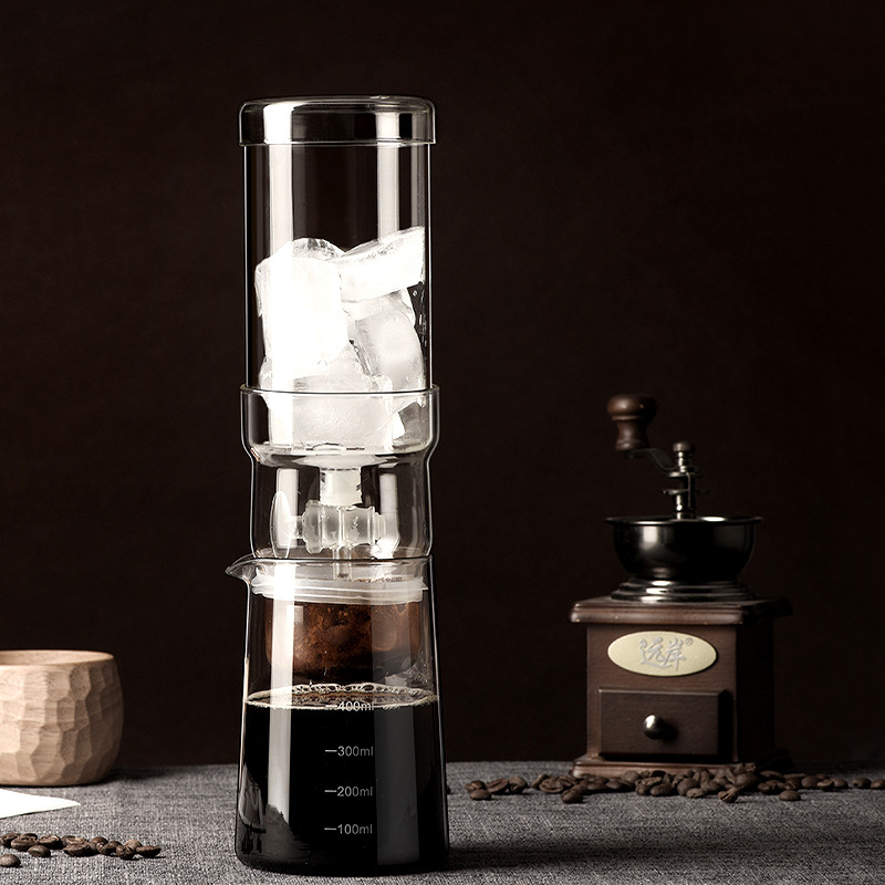 A household cold drip coffee maker with transparent high borosilicate heat-resistant glass and a closed inverted drip filter for cold brew coffee full figure