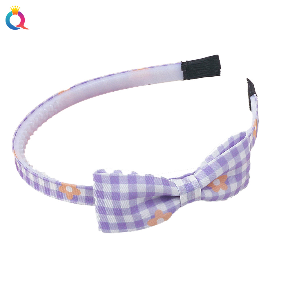Qiyue Children's cute bow hair band for girls, anti-slip headband with teeth for pressing hair, wholesale hair clips and hair accessories Item Picture