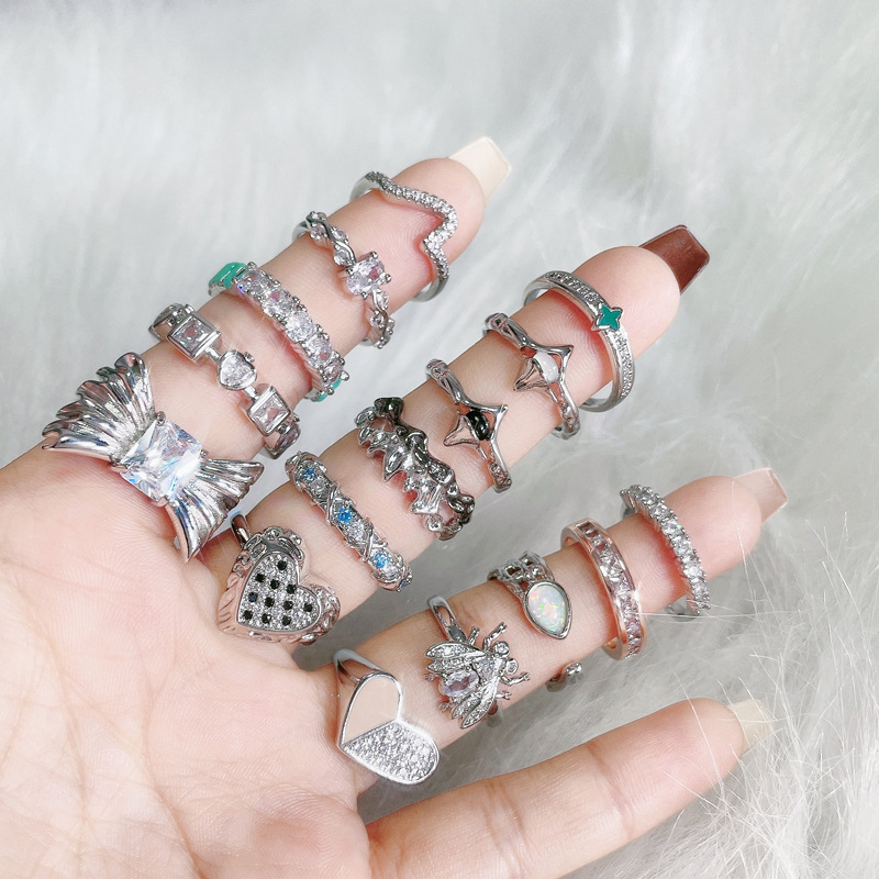 This is an irregular-textured bow, heart-shaped, open-mouth ring with an ins niche design and a light luxury index finger ring Specification drawing