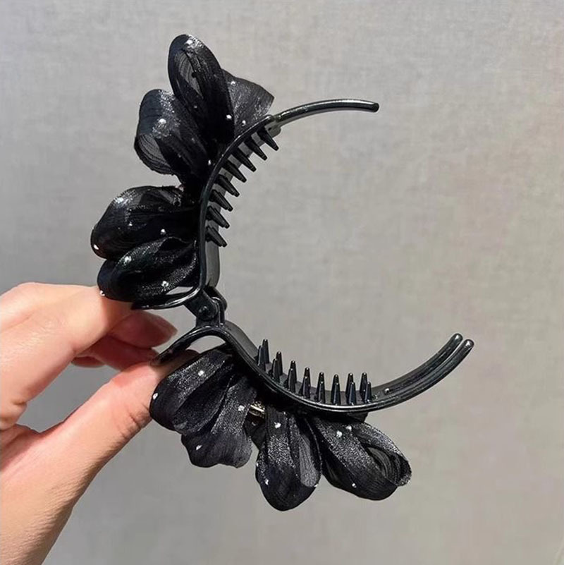 New silk yarn bun hair clip, bubble fashion black small chanel-style hair clip, Korean version of the back of the head ponytail fixing clip Application Scenario