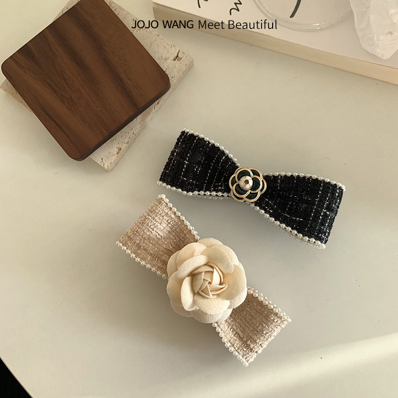 Korean camellia bow hairpin for women, a high-end hair accessory, a spring clip for the back of the head full figure