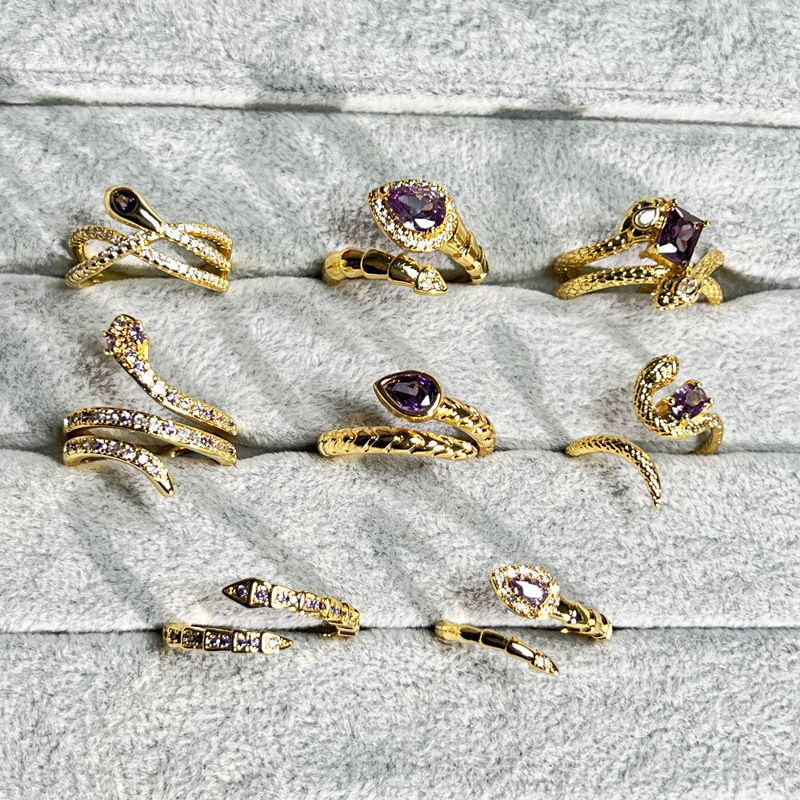 A high-end retro, niche, and sophisticated ring made of gold zircon with adjustable snake-shaped openings for the Year of the Snake full figure