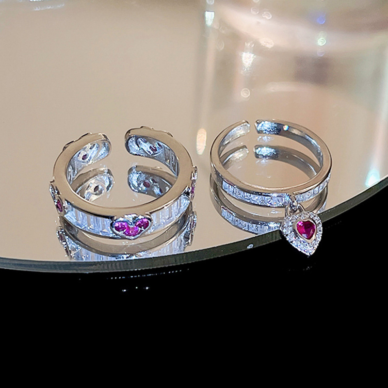 This light luxury and high-end heart-shaped zircon open ring features a niche design, a simple and individualistic style, and an ink-style, cool vibe full figure